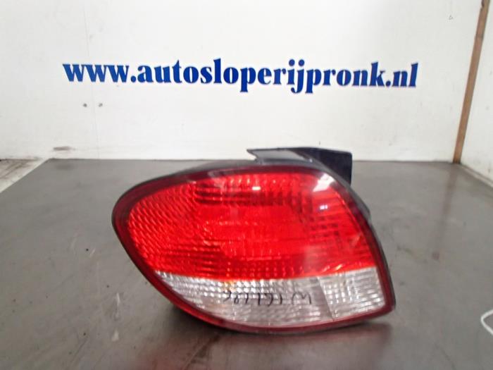 Taillight, left from a Hyundai Coupe 2.0i 16V 2001