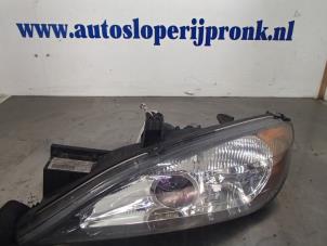 Used Headlight, left Nissan Primera (P11) 1.8 16V Price € 50,00 Margin scheme offered by Autosloopbedrijf Jan Pronk B.V.