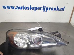 Used Headlight, right Nissan Primera (P11) 1.8 16V Price € 40,00 Margin scheme offered by Autosloopbedrijf Jan Pronk B.V.