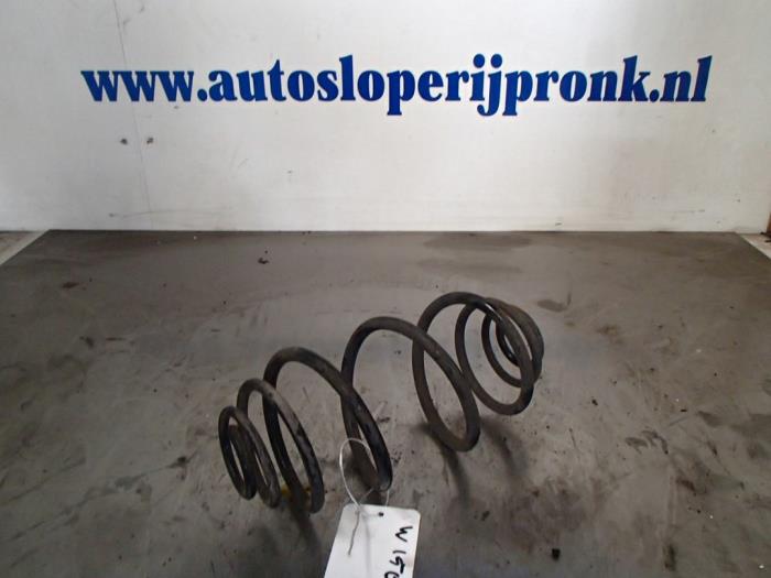 Rear coil spring from a Nissan Almera (N16) 2.2 Di 16V 2001