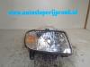 Headlight, right from a Daihatsu Cuore (L251/271/276), 2003 1.0 12V DVVT, Hatchback, Petrol, 989cc, 43kW (58pk), FWD, EJVE, 2000-10 / 2003-02, L701 2001