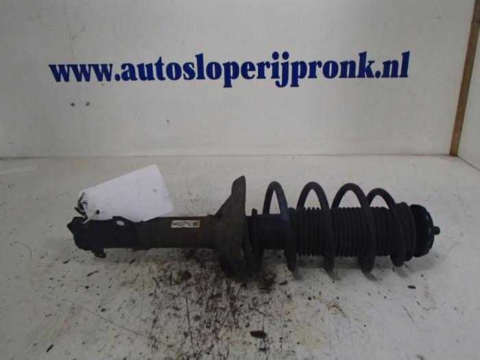 Front shock absorber rod, left from a Volkswagen Lupo (6X1) 1.0 MPi 50 1999