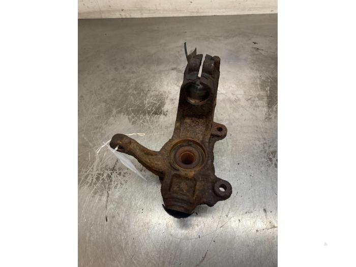 Knuckle, front left from a Ford Mondeo IV Wagon 2.3 16V 2009