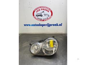 Used Headlight, left Volkswagen Polo IV (9N1/2/3) 1.4 16V 75 Price € 40,00 Margin scheme offered by Autosloopbedrijf Jan Pronk B.V.