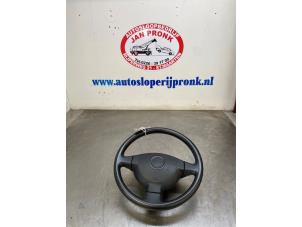 Used Steering wheel Daihatsu Cuore (L251/271/276) 1.0 12V DVVT Price € 40,00 Margin scheme offered by Autosloopbedrijf Jan Pronk B.V.