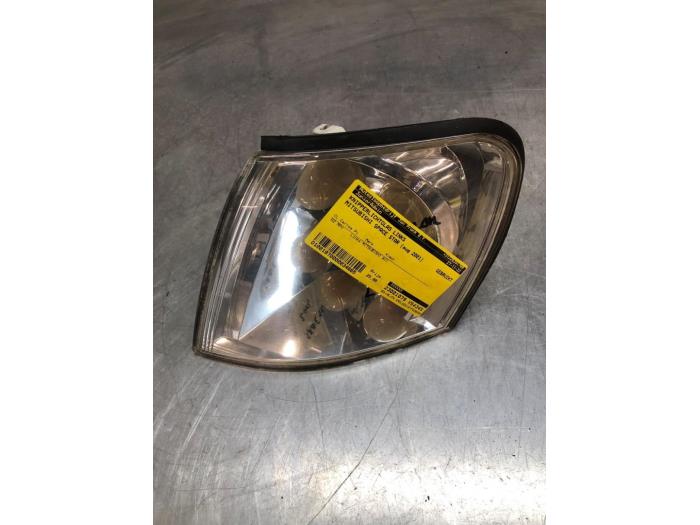 Indicator lens, left from a Mitsubishi Space Star (DG) 1.3 16V 2001