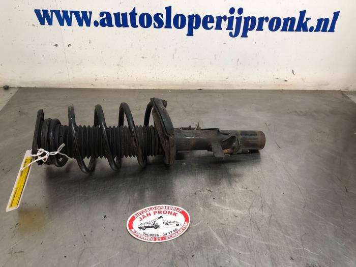 Front shock absorber rod, left from a Ford Focus 3 1.0 Ti-VCT EcoBoost 12V 100 2012