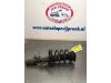 Front shock absorber rod, left from a Ford Focus 3 1.0 Ti-VCT EcoBoost 12V 100 2012