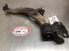 Front wishbone, left from a Ford Focus 3 1.0 Ti-VCT EcoBoost 12V 100 2012