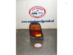Used Taillight, left Subaru Forester (SF) 2.0 16V Price € 75,00 Margin scheme offered by Autosloopbedrijf Jan Pronk B.V.