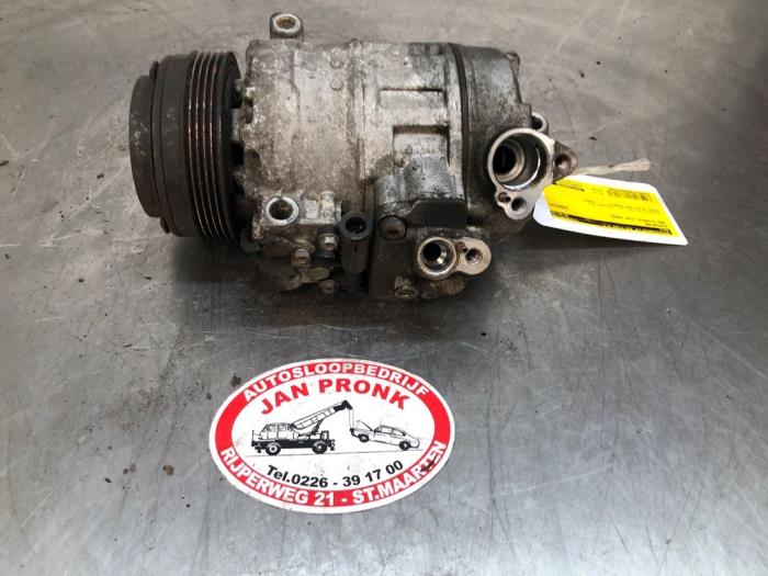 Air conditioning pump from a BMW 5 serie Touring (E39) 530i 24V 2002