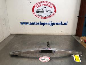 Used Tailgate handle Opel Astra H GTC (L08) 1.4 16V Twinport Price € 25,00 Margin scheme offered by Autosloopbedrijf Jan Pronk B.V.