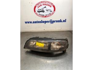 Begagnade Strålkastare, vänster Volvo V70 (SW) 2.4 20V 170 Pris € 75,00 Marginaltabell erbjuds av Autosloopbedrijf Jan Pronk B.V.