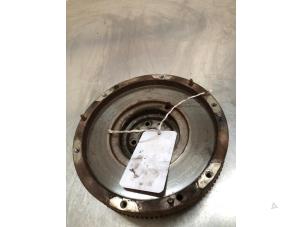 Flywheel from a Fiat Doblo Cargo (263) 1.3 MJ 16V DPF Euro 5 2013