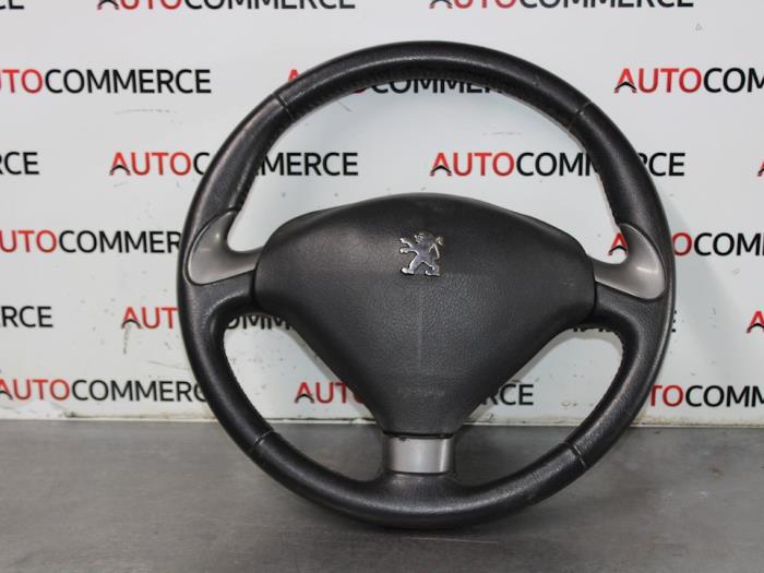 Steering wheel from a Peugeot 407 SW (6E) 1.8 16V 2004