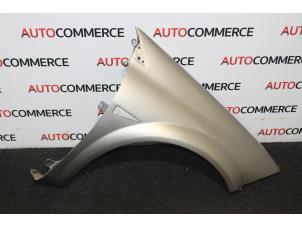 Used Front wing, right Renault Megane II (BM/CM) 1.6 16V Price on request offered by Autocommerce