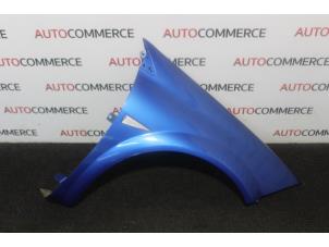 Used Front wing, right Renault Megane II (BM/CM) 1.4 16V 98 Price on request offered by Autocommerce