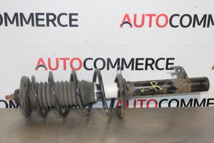 Front shock absorber, right from a Peugeot 107 1.0 12V 2011