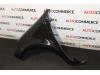 Front wing, left from a Renault Clio III (BR/CR) 1.5 dCi 105 2006
