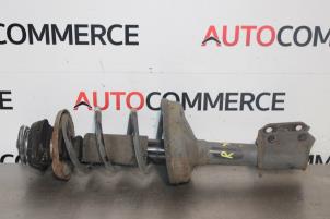 Used Front shock absorber, right Renault Clio III (BR/CR) 1.4 16V Price on request offered by Autocommerce
