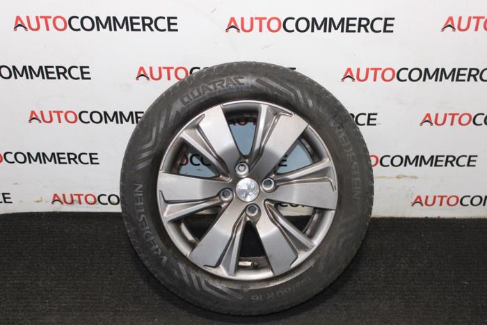 Wheel + winter tyre from a Peugeot 2008 (CU)  2018