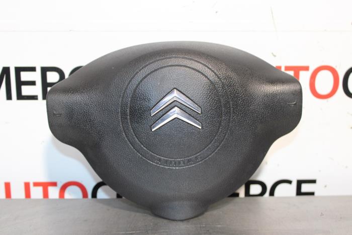 Left airbag (steering wheel) from a Citroën Berlingo 1.6 Hdi 75 16V Phase 1 2009