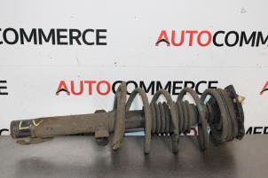 Used Fronts shock absorber, left Renault Megane II (BM/CM) 1.4 16V 98 Price on request offered by Autocommerce