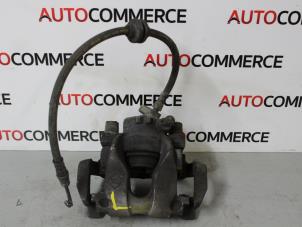 Used Rear brake calliper, left Renault Clio III (BR/CR) 1.2 16V 75 Price on request offered by Autocommerce
