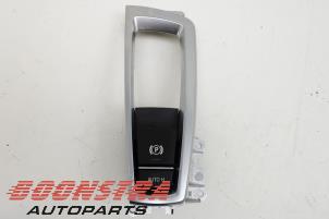Used Parking brake switch BMW 5 serie Touring (F11) 535i xDrive 24V TwinPower Turbo Price € 29,95 Margin scheme offered by Boonstra Autoparts