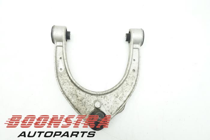 Front upper wishbone, left from a BMW 5 serie Touring (F11) 535i xDrive 24V TwinPower Turbo 2011