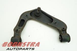 Used Front upper wishbone, left Nissan Pathfinder (R51) 2.5 dCi 16V 4x4 Price € 44,25 Margin scheme offered by Boonstra Autoparts