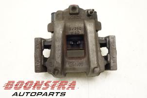 Used Rear brake calliper, left BMW 1 serie (F20) 118d 2.0 16V Price € 36,75 Margin scheme offered by Boonstra Autoparts