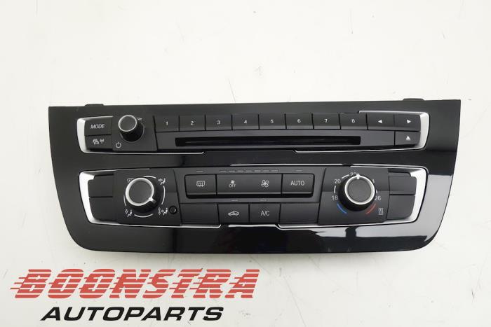 Heater control panel from a BMW 1 serie (F20) 116i 1.5 12V 2018