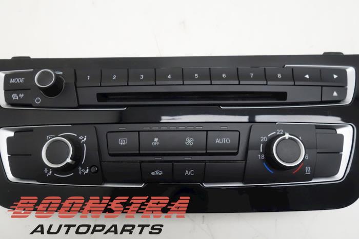 Heater control panel from a BMW 1 serie (F20) 116i 1.5 12V 2018