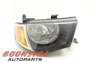 Used Headlight, right Mitsubishi L-200 2.5 DI-D 4x4 Price € 74,25 Margin scheme offered by Boonstra Autoparts