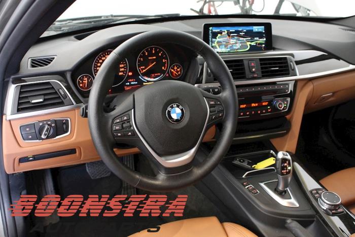 Pantalla Head-up de un BMW 3 serie Touring (F31) 320d 2.0 16V EfficientDynamicsEdition 2015