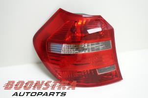 Used Taillight, left BMW 1 serie (E81) 116i 1.6 16V Price € 29,95 Margin scheme offered by Boonstra Autoparts