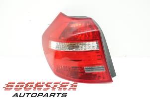 Used Taillight, left BMW 1 serie (E81) 118i 16V Price € 29,95 Margin scheme offered by Boonstra Autoparts