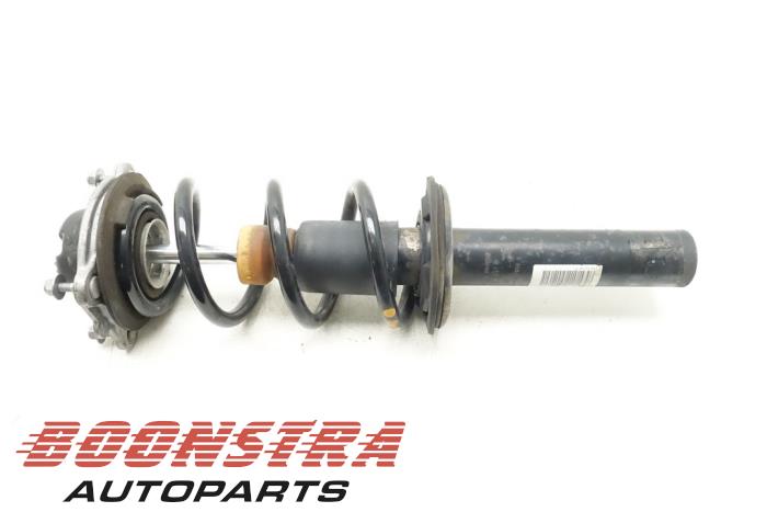 Shock absorber with coil spring