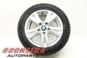 Usagé Jante + pneu d'hiver BMW 1 serie (E81) 116i 1.6 16V Prix € 79,00 Règlement à la marge proposé par Boonstra Autoparts