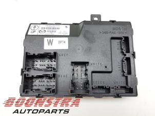 Usados Caja de fusibles Mazda 2 (DE) 1.3 16V MZR Precio € 99,00 Norma de margen ofrecido por Boonstra Autoparts