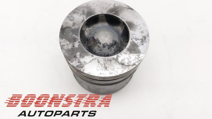 Piston from a Land Rover Range Rover III (LM) 3.6 TDV8 32V 2009