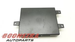 Bluetooth-modul från en Volkswagen Multivan T5 (7E/7HC/7HF/7HM) 2.5 TDi 2008