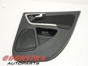 Used Rear door trim 4-door, right Volvo V60 I (FW/GW) 1.6 DRIVe Price € 49,95 Margin scheme offered by Boonstra Autoparts