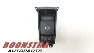 Used Parking brake switch BMW X6 (E71/72) xDrive40d 3.0 24V Price € 37,95 Margin scheme offered by Boonstra Autoparts