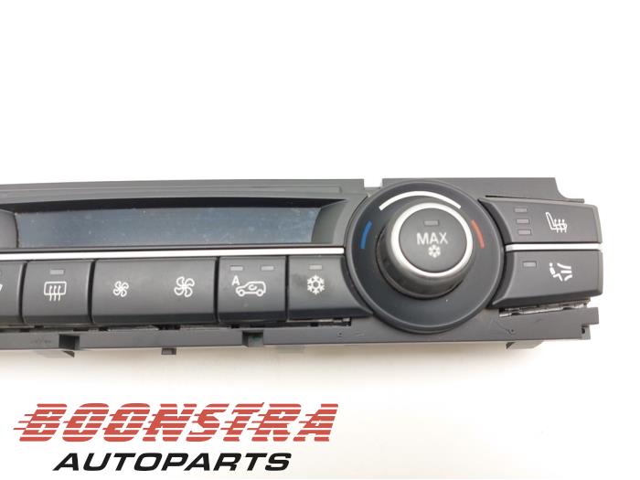 Heater control panel from a BMW X6 (E71/72) xDrive40d 3.0 24V 2010