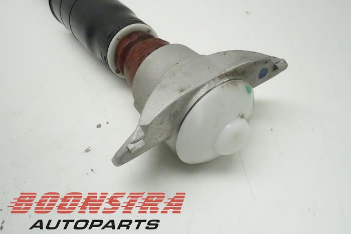 Rear shock absorber rod, left from a Audi A5 2021
