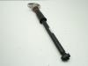 Rear shock absorber rod, left from a Audi A5 2021