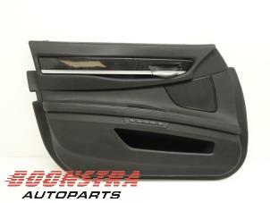 Usagé Revêtement portière 4portes avant gauche BMW 7 serie (F01/02/03/04) 730d 24V Prix € 99,95 Règlement à la marge proposé par Boonstra Autoparts