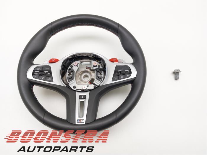 Steering wheel from a BMW M8 Gran Coupe (G16) M8 Competition 4.4i V8 32V 2021